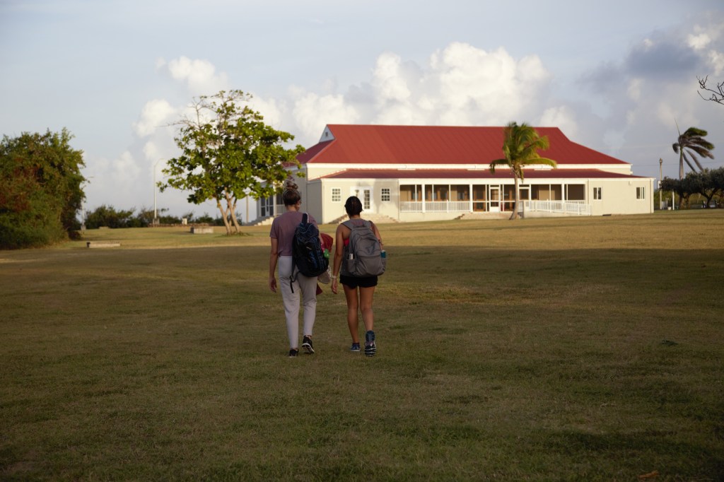 Two Students Walking in MUA Campus