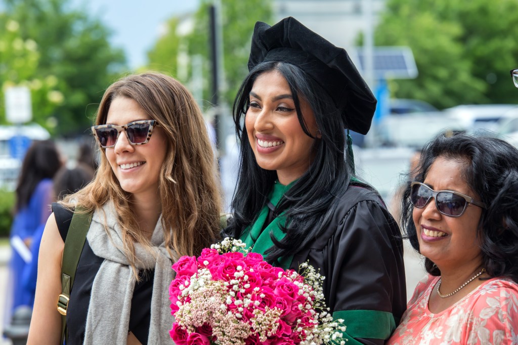 MUA Student in Graduation Gown and Cap Celebrating Her Achievements on Commencement Ceremony