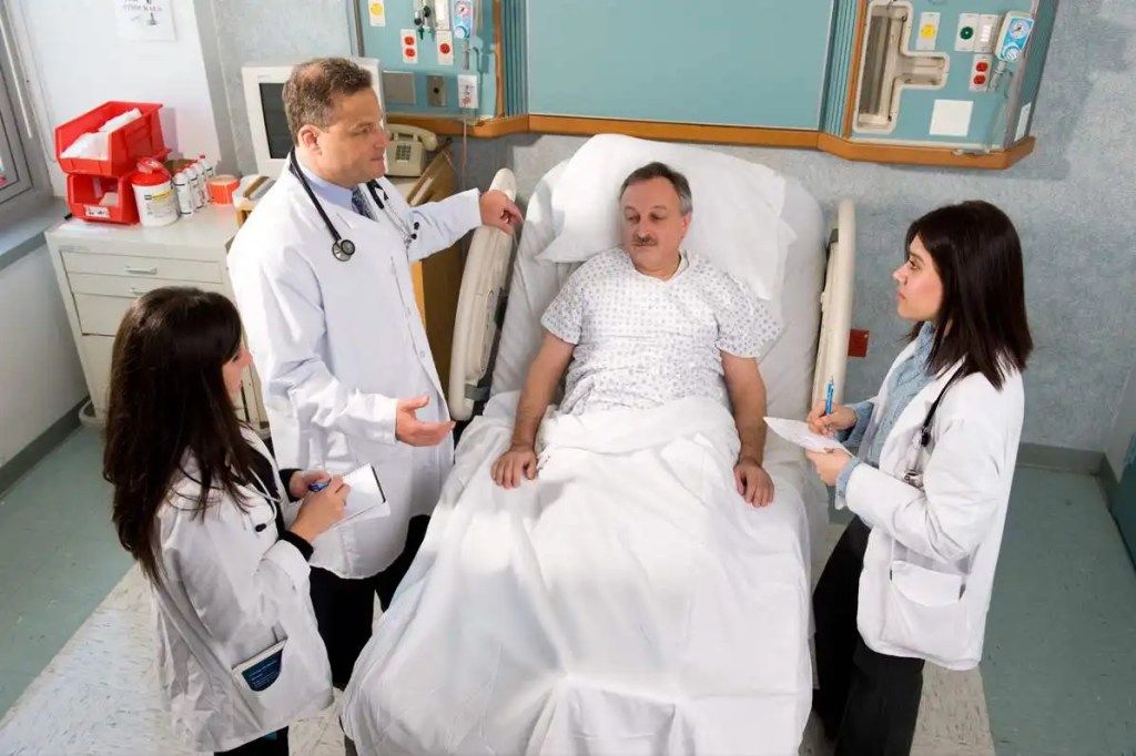 Medical Room with Patient and Doctors