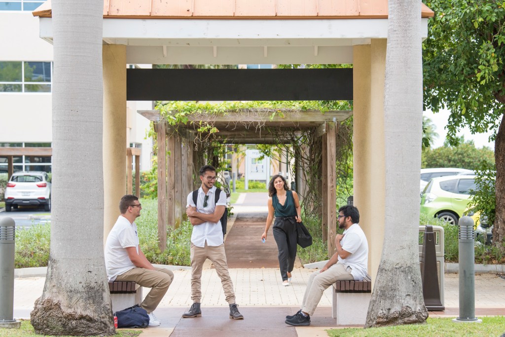 Students waiting outside before going into campus