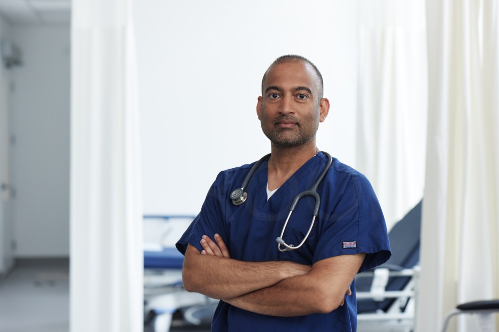 Image of Dr. Pinto in scrubs